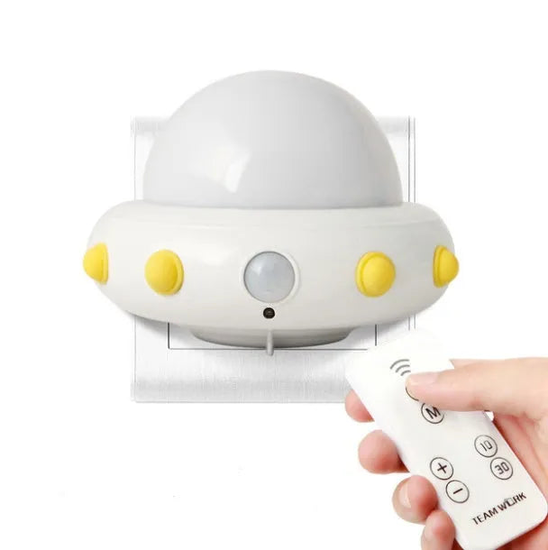 Remote control UFO shaped bedside night light in blue, pink or white colours