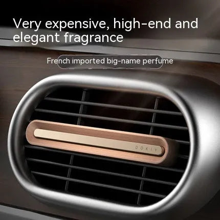 Solid long strip car vent aromatherapy ornament in walnut and metallic grey colours with two sticks