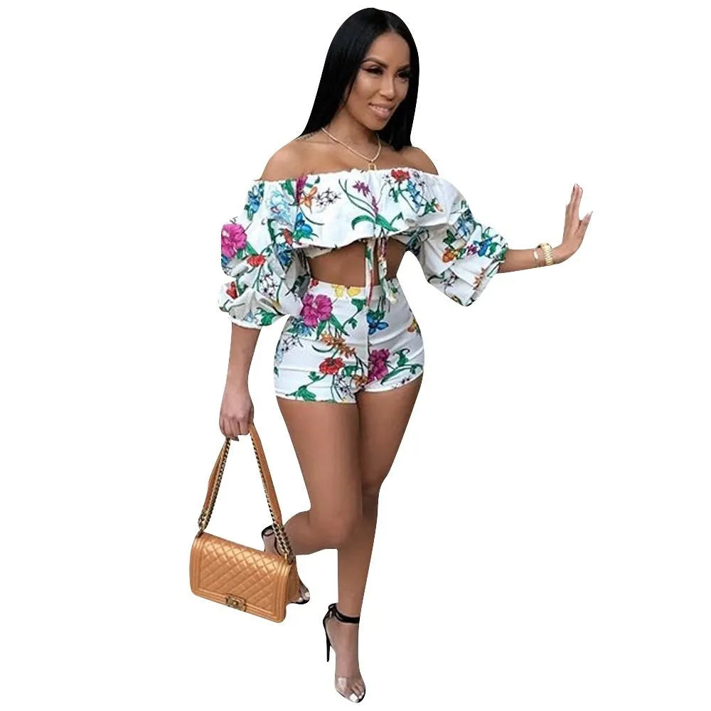 Multicolour digitally printed women's two-piece lounge set with pile sleeves and shorts.