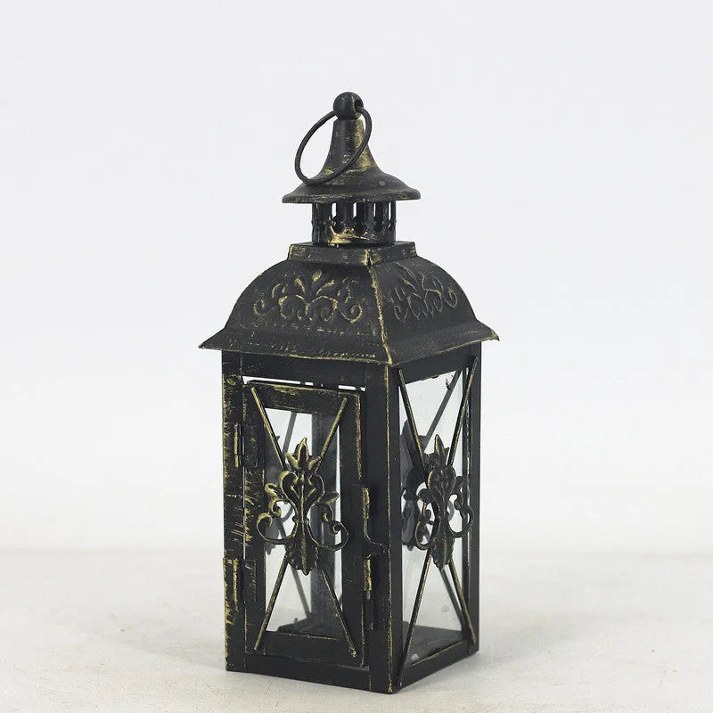 European black and white wrought iron floor-standing storm lantern with tempered glass in three sizes for courtyard decoration.