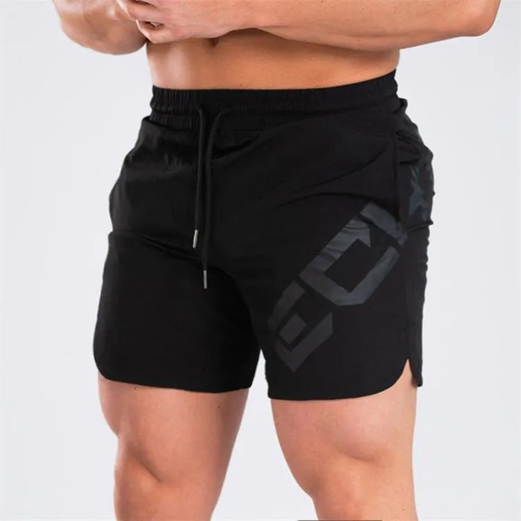 Men's black quick-dry elastic waist running shorts on a white background.