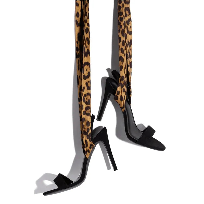Light brown leopard print Roman style high heels with cross strap design and 8cm heel