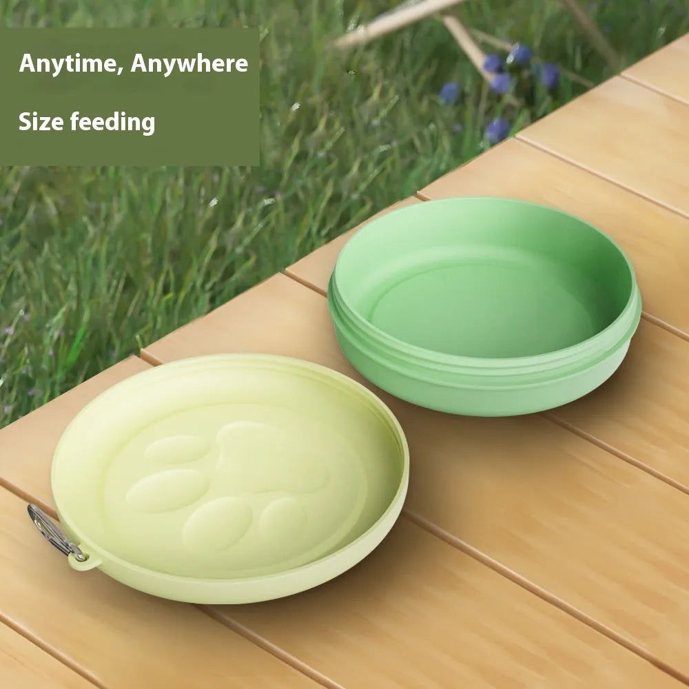 Portable plastic dog feeding bowl in green and pink colour options for outdoor use