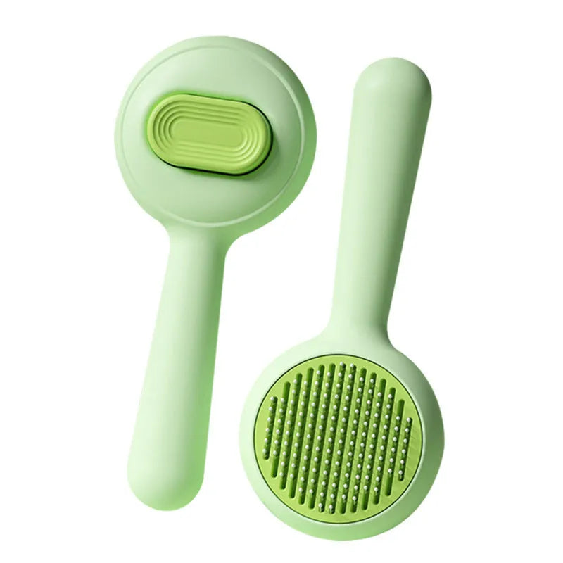 Stainless steel pet grooming brush with non-slip handle in green and yellow colour options for cats and dogs