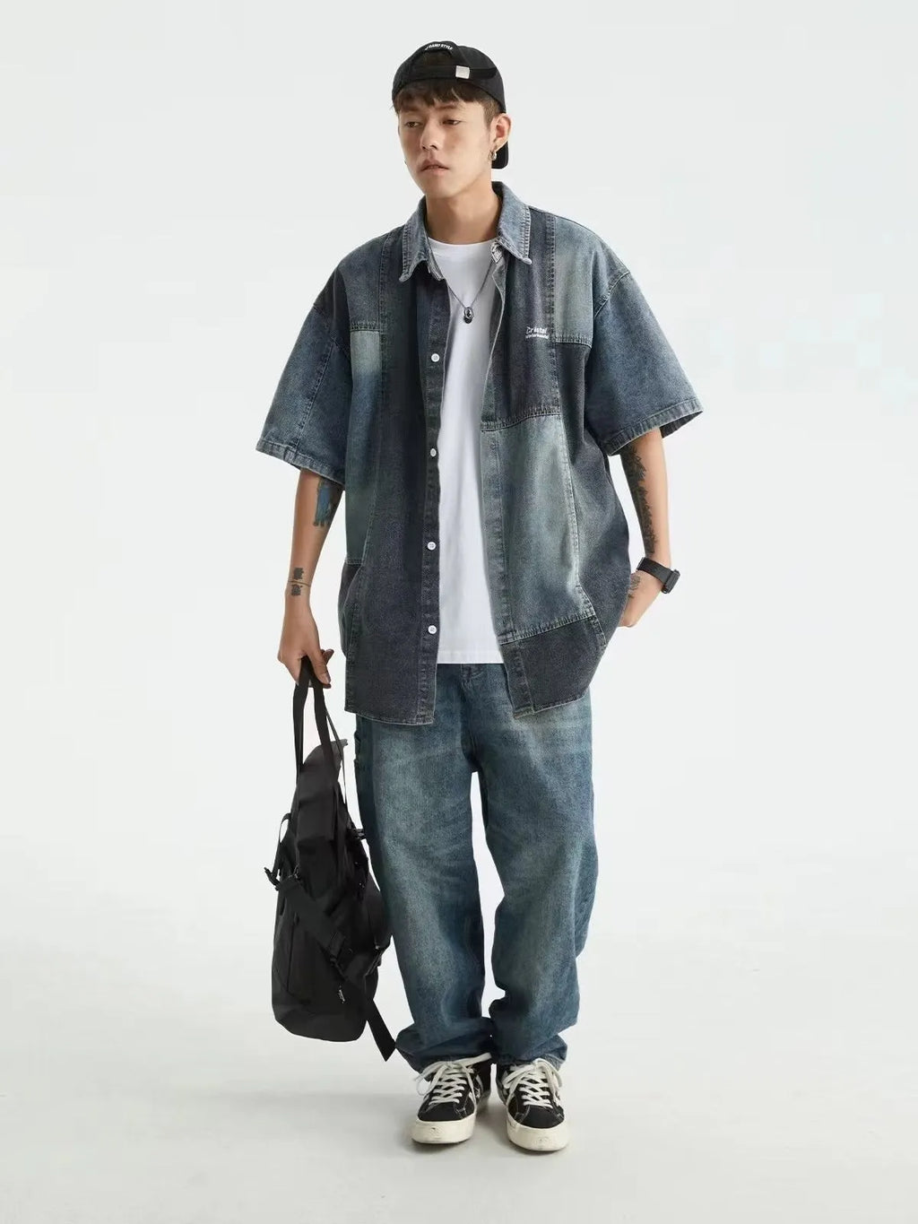 Blue Japanese-style loose fit denim shirt for men with washed stitching detail