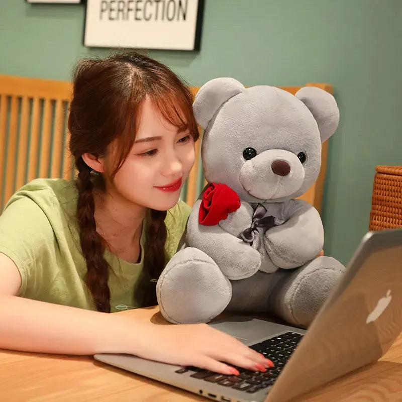 Soft plush Rose Bear teddy bear toy in beige, brown or grey, shown in sizes from 23cm to 45cm.