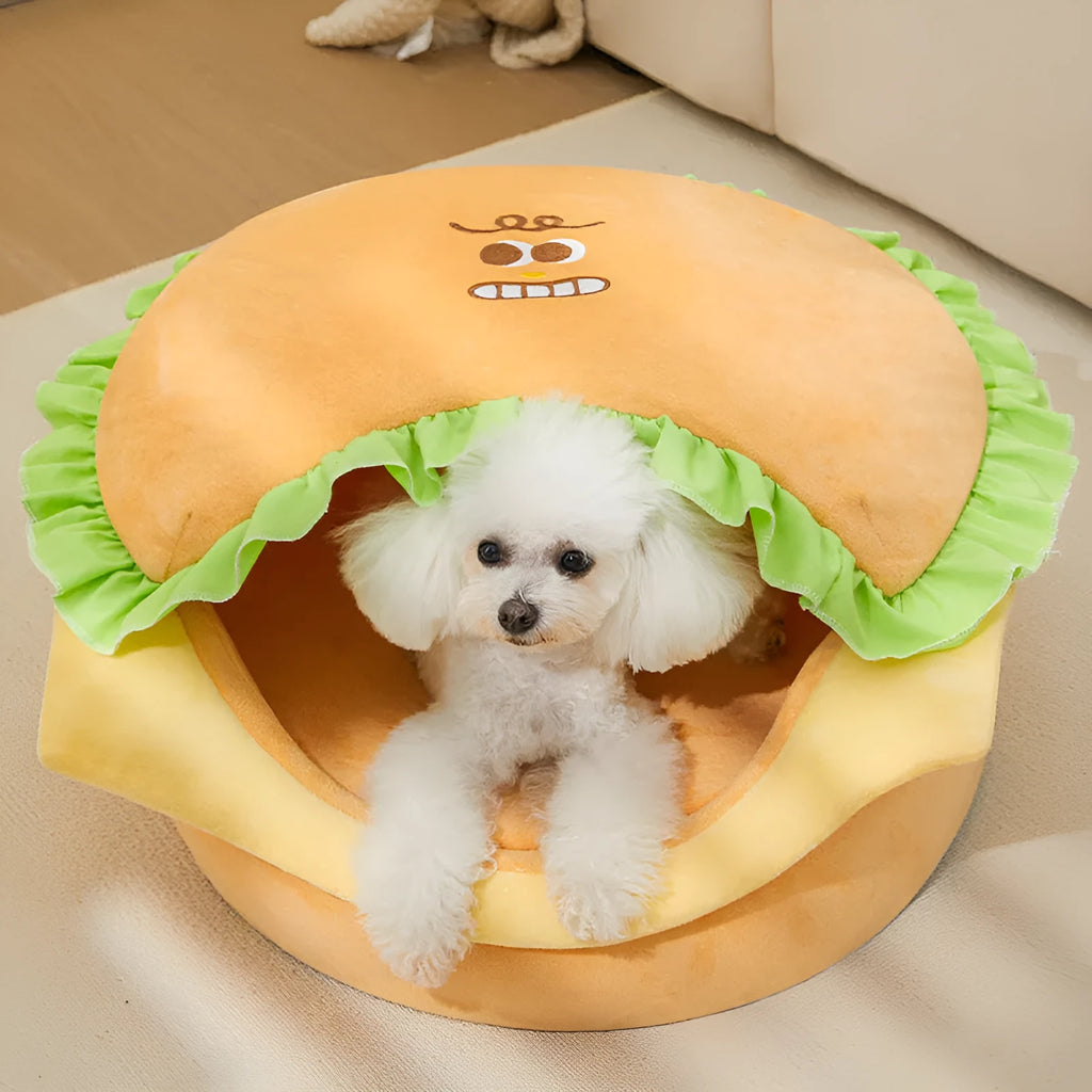 Medium-sized grey cat kennel with a removable roof panel and a soft beige cushion inside.