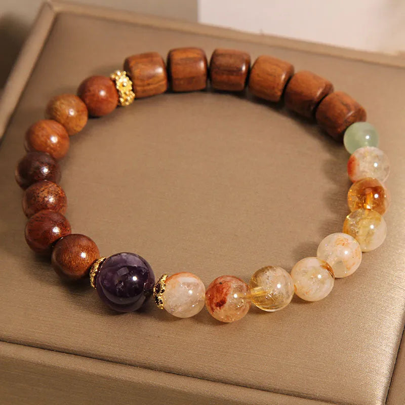 Yellow tower crystal and ebony amethyst bracelet with pearl, rhinestone, and sequin detailing for women