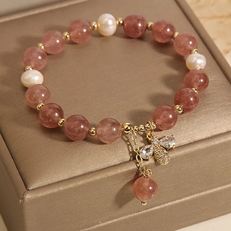 Women's freshwater pearl and strawberry quartz bracelet with zircon details on alloy chain