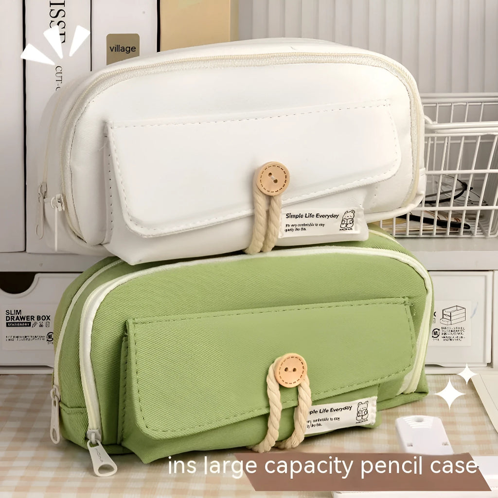 Large Korean-style canvas pencil case for girls in green, holding multiple pens.