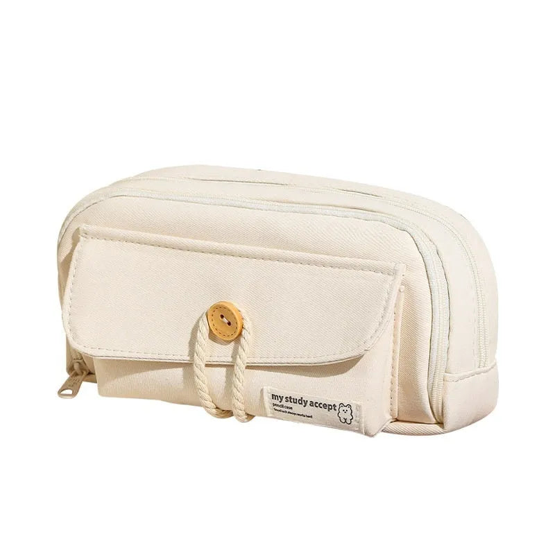 Large Korean-style canvas pencil case for girls in green, holding multiple pens.