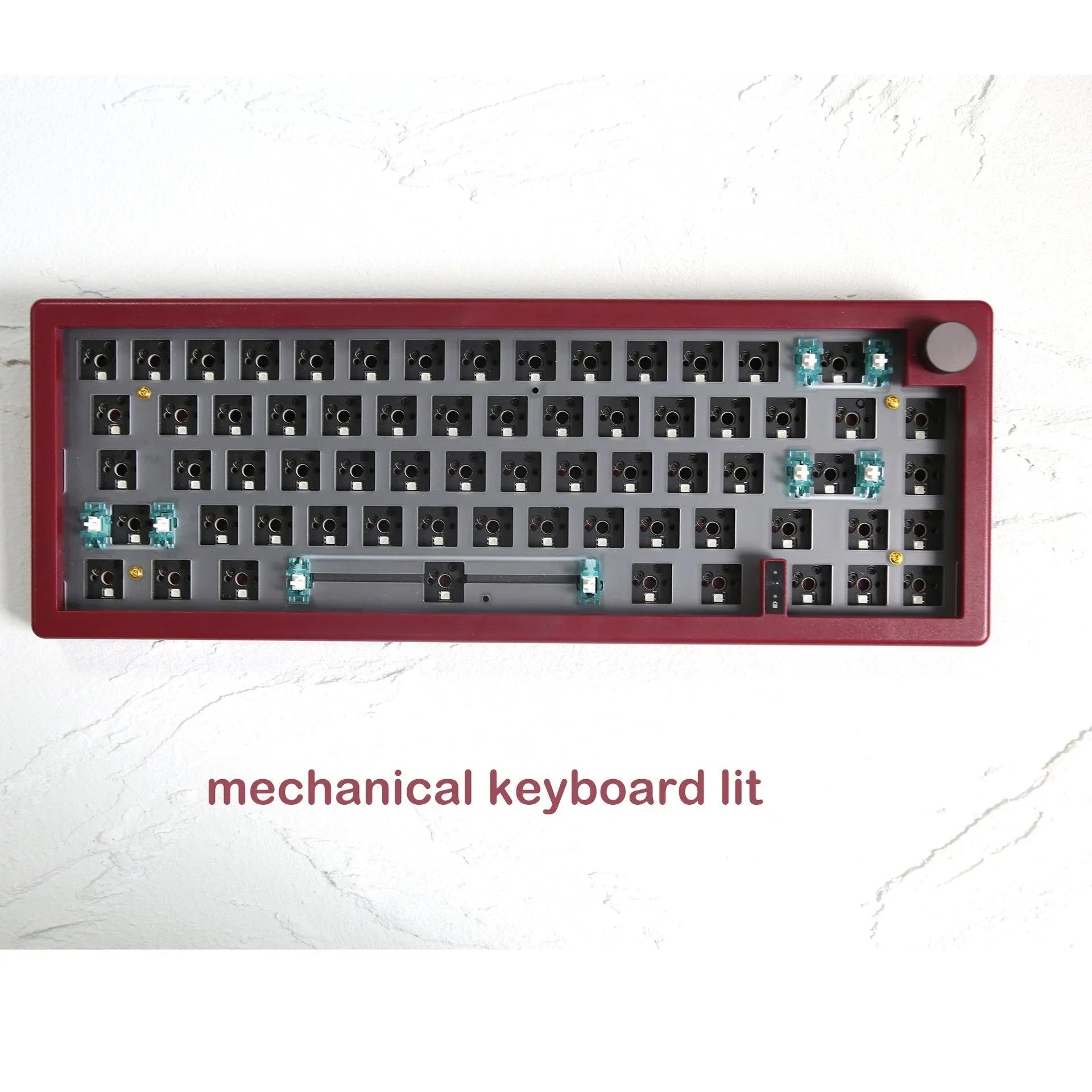 DIY mechanical keyboard kit with RGB lighting and control knob in seven colour options