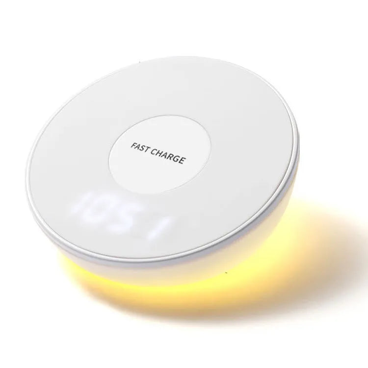 White wireless phone charger with digital clock display, three control buttons, and LED night light