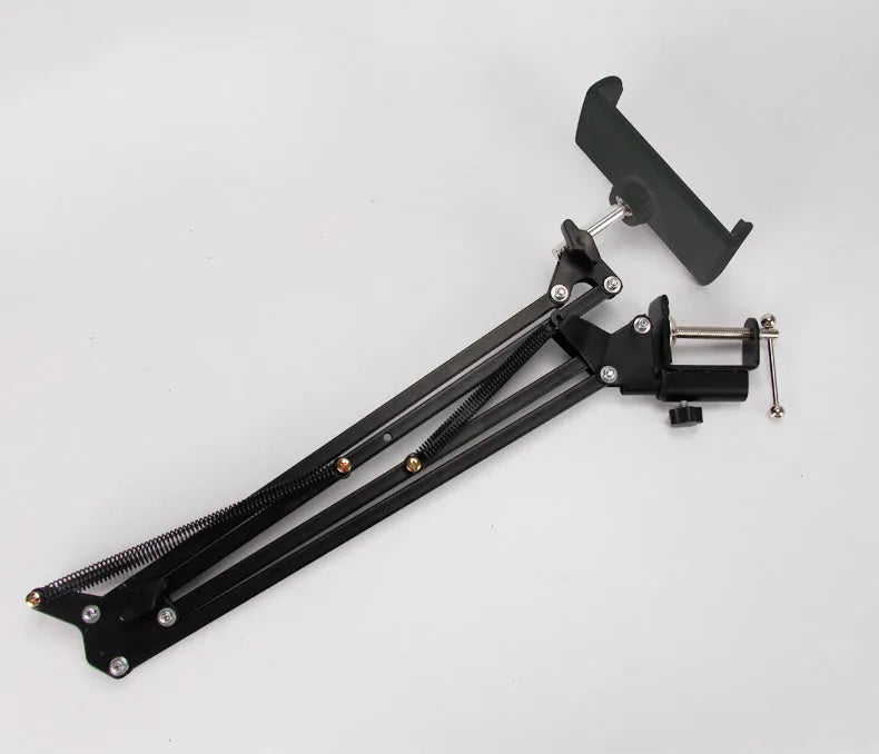 10cm black and white mobile phone tablet stand on flat surface