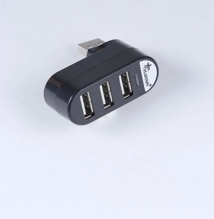 Black and white USB 2.0 splitter hub showing multiple USB ports for computer expansion