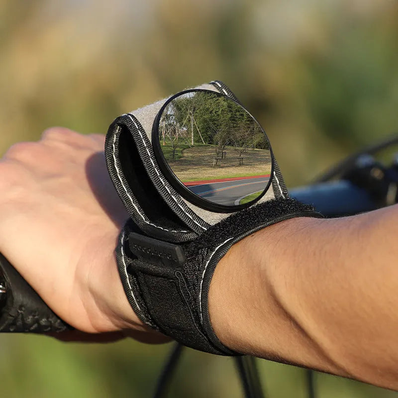 Black nylon bicycle rear-view mirror mounted on handlebars for cycling safety