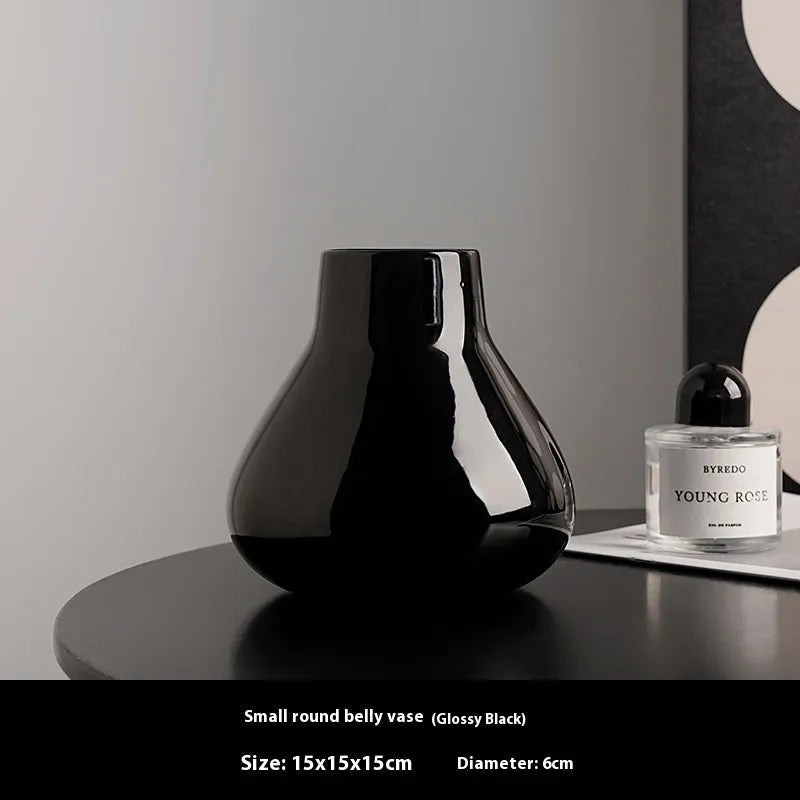 Modern black ceramic vase set with artificial white orchid flowers for home decoration