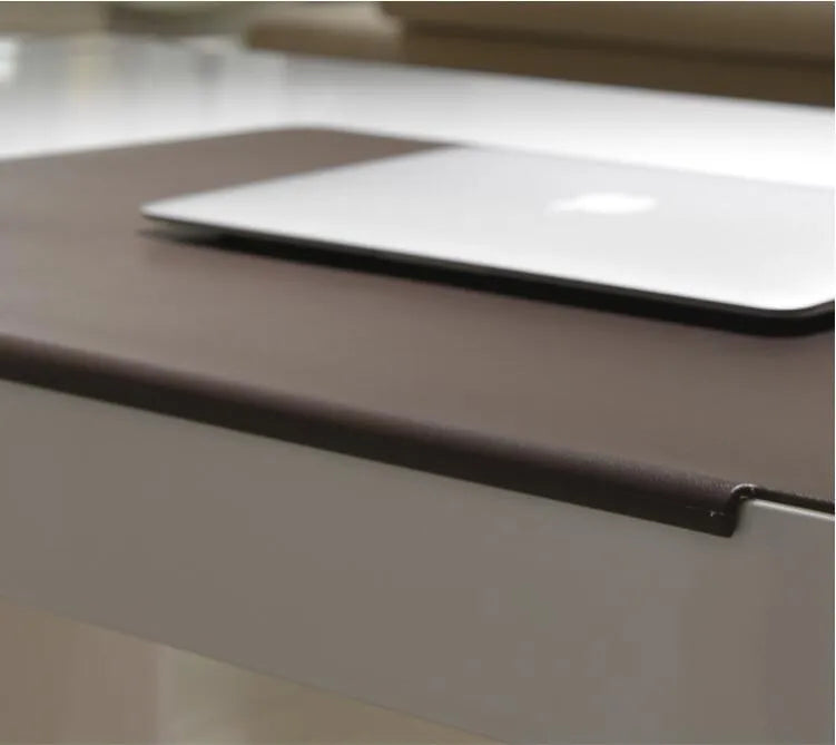 Black large PVC computer desk mat 700x450x3mm for keyboard and mouse on a wooden desk
