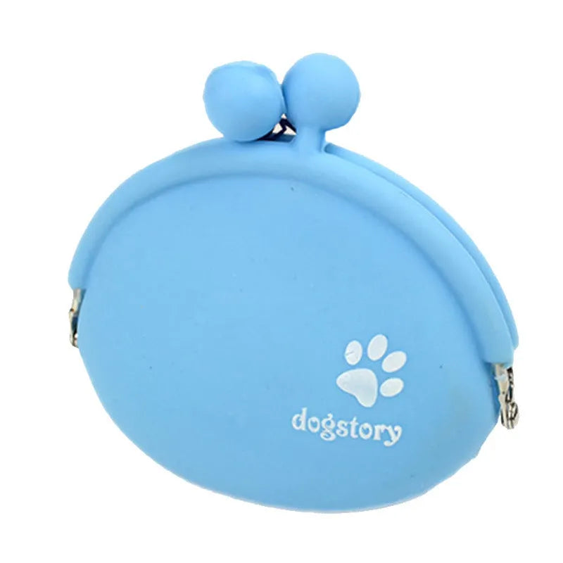 Yellow silicone pouch with hook-and-loop closure for dog treats, shown on a waistband.