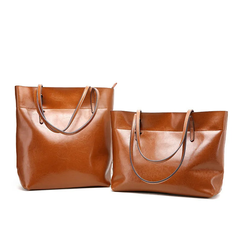 Casual wax cowhide leather ladies crossbody handbag shown in a choice of colours including black, brown, and rose red.