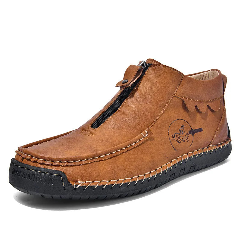 Men's black slip-on leather loafers with round toe and stitching detail on a solid colour background.