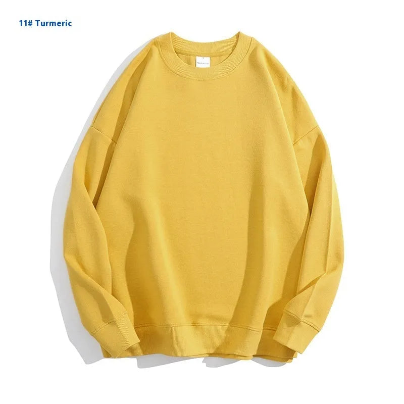 Women's loose fit cotton off shoulder sweater in a solid colour on a hanger.