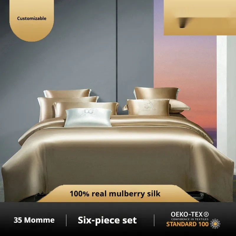 Silk four-piece quilt cover set in a solid colour displayed on a bed, showing the quilt cover and matching pillowcases.