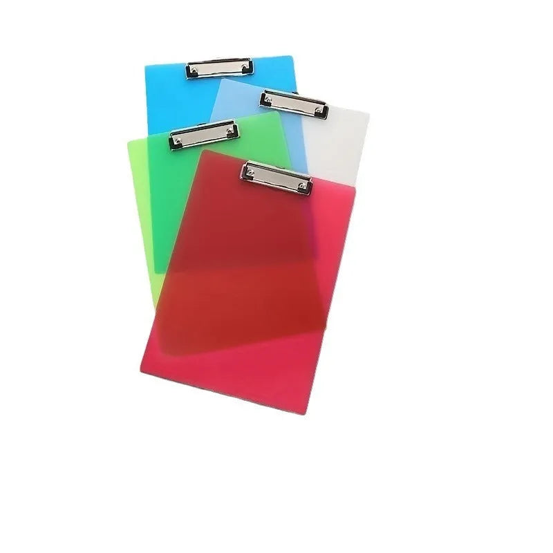 A4 transparent plastic writing board pad with metal clip in blue colour on a desk