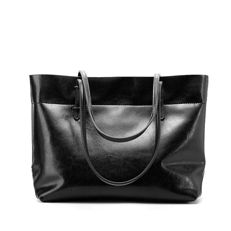 Casual wax cowhide leather ladies crossbody handbag shown in a choice of colours including black, brown, and rose red.