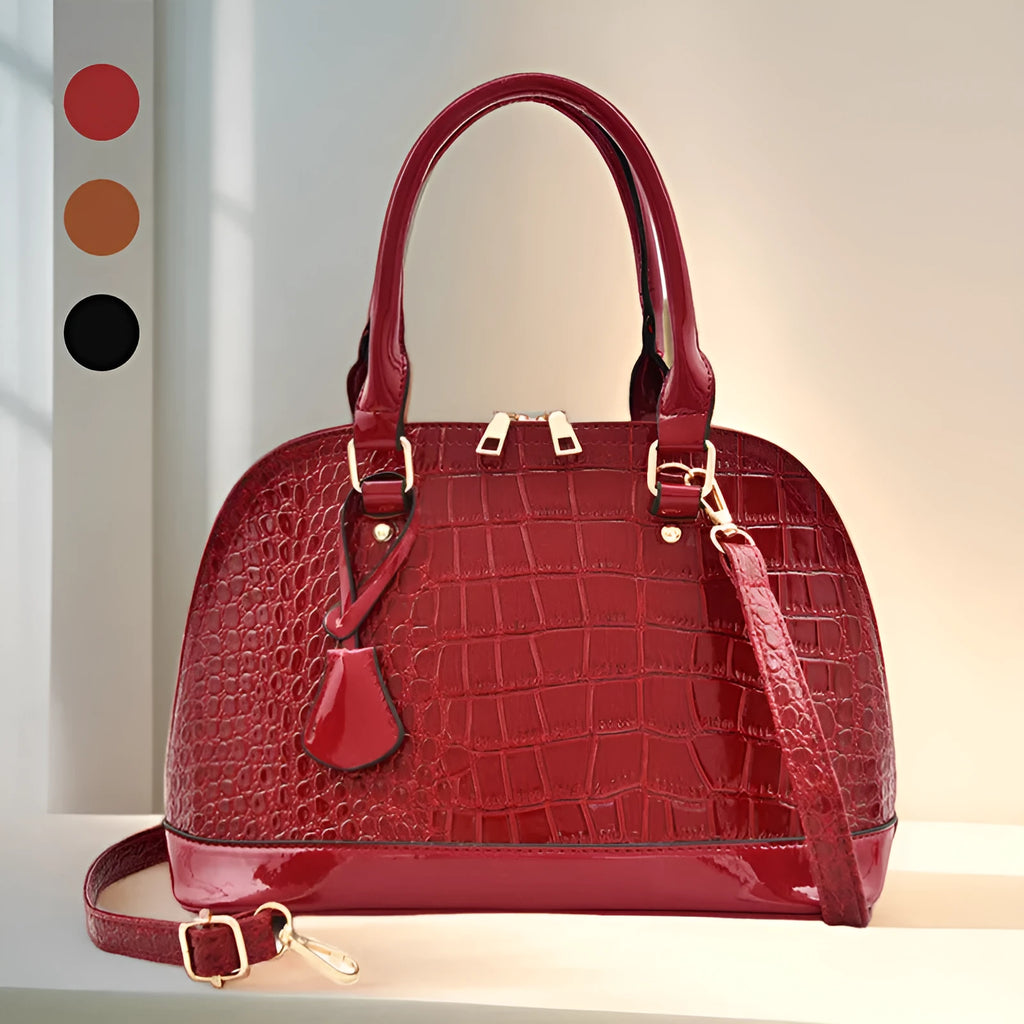 Shiny PU crossbody shoulder bag in shell shape showing black, red, and brown colour options