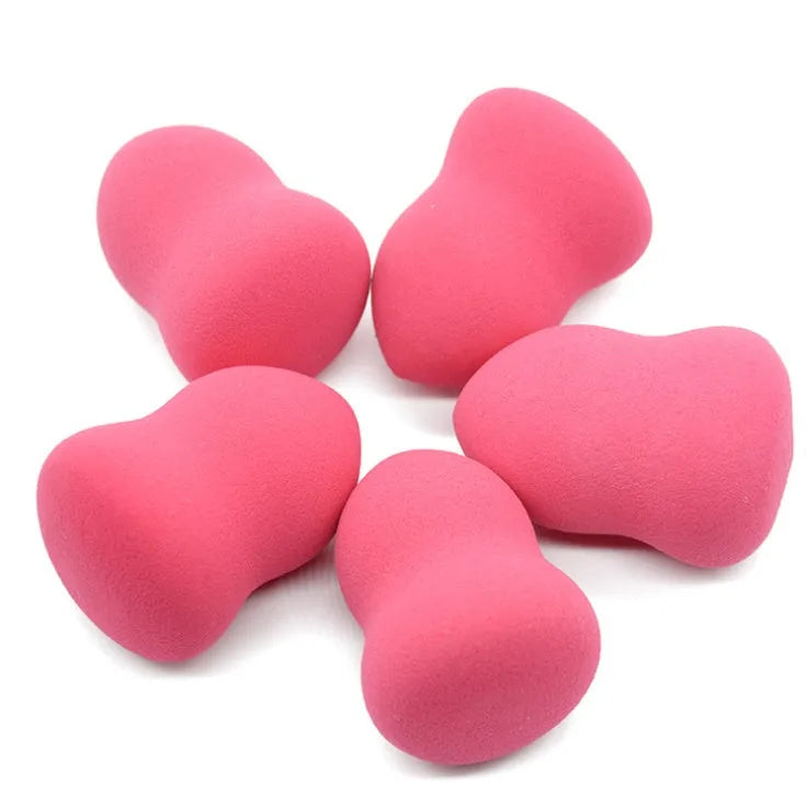 Pink non-latex makeup foundation sponge measuring 4x4x5.6cm