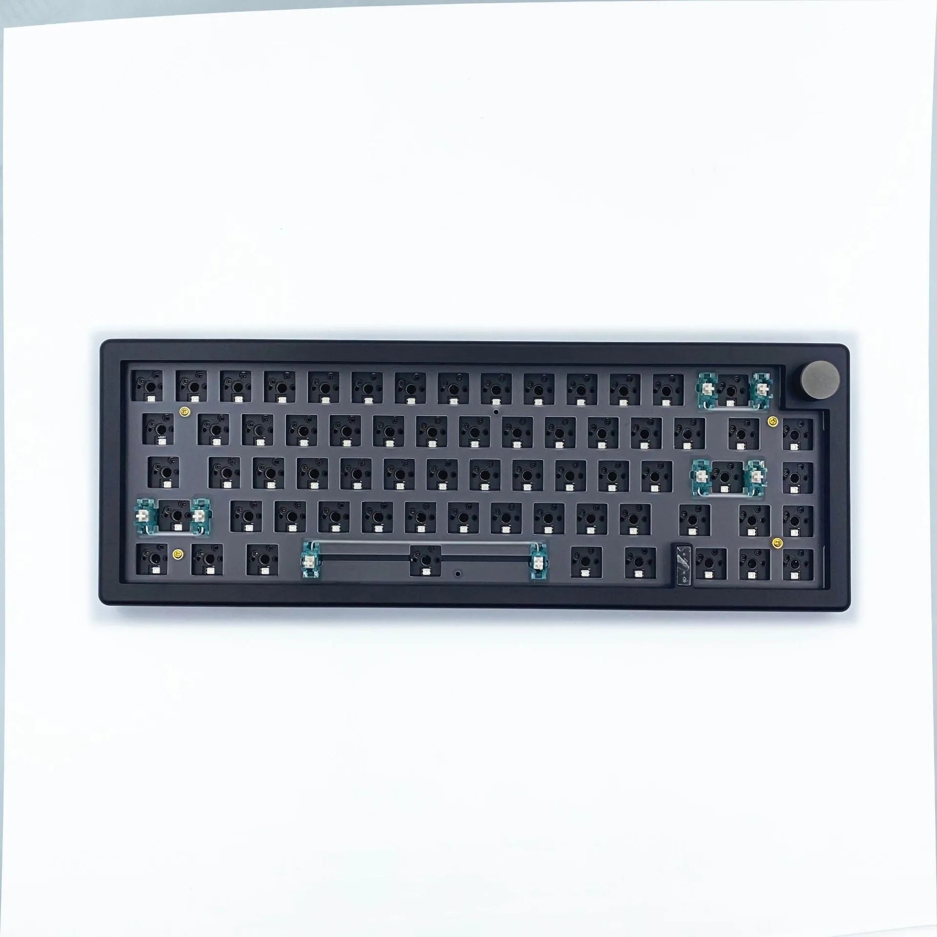 DIY mechanical keyboard kit with RGB lighting and control knob in seven colour options