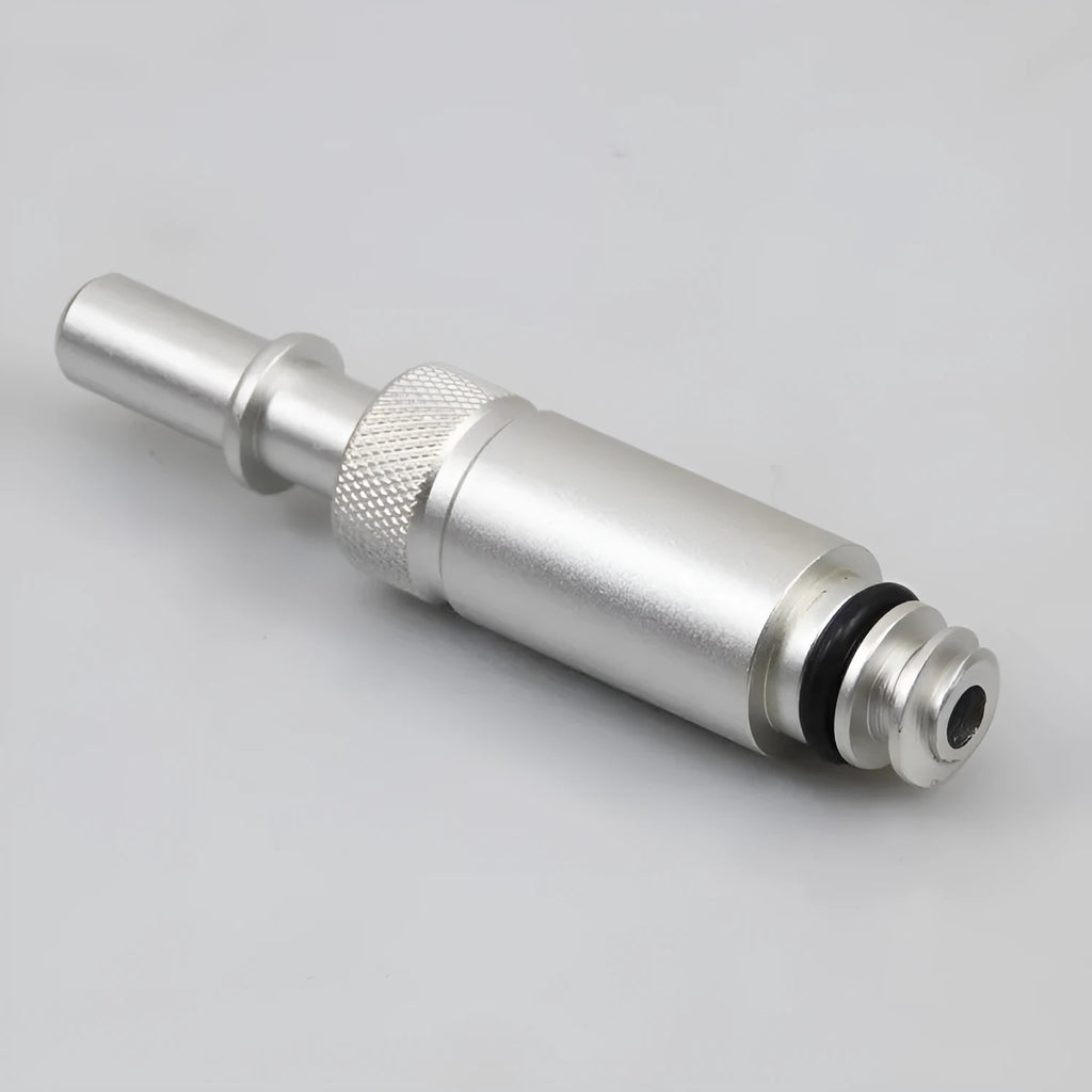 Silver metal VAS6262-9 transmission refueling joint adapter tool on a workshop bench