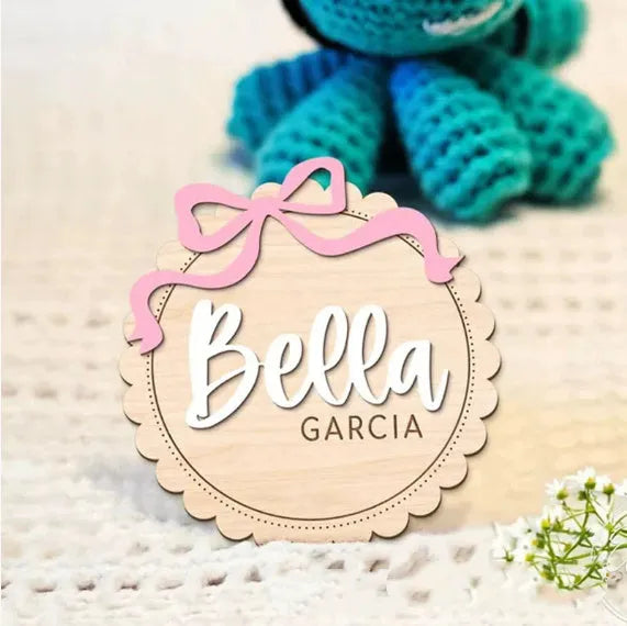Square wooden baby photo prop ornament with a customised name for nursery decor.