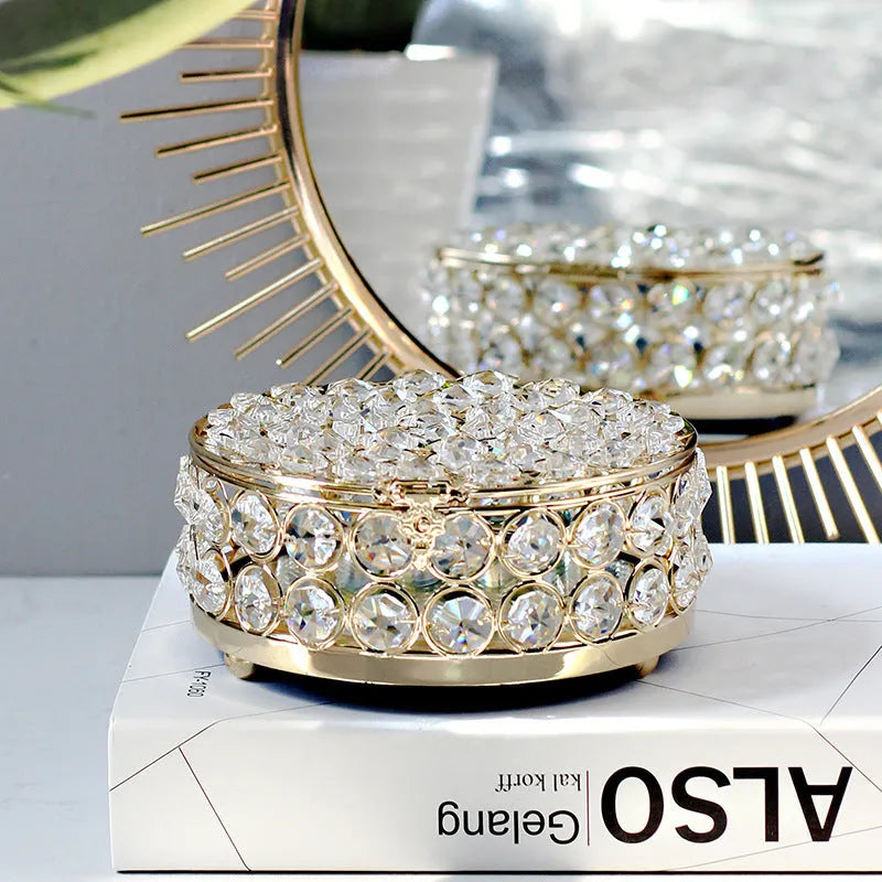 French gold European style jewellery storage box with transparent crystal glass sides and lid.