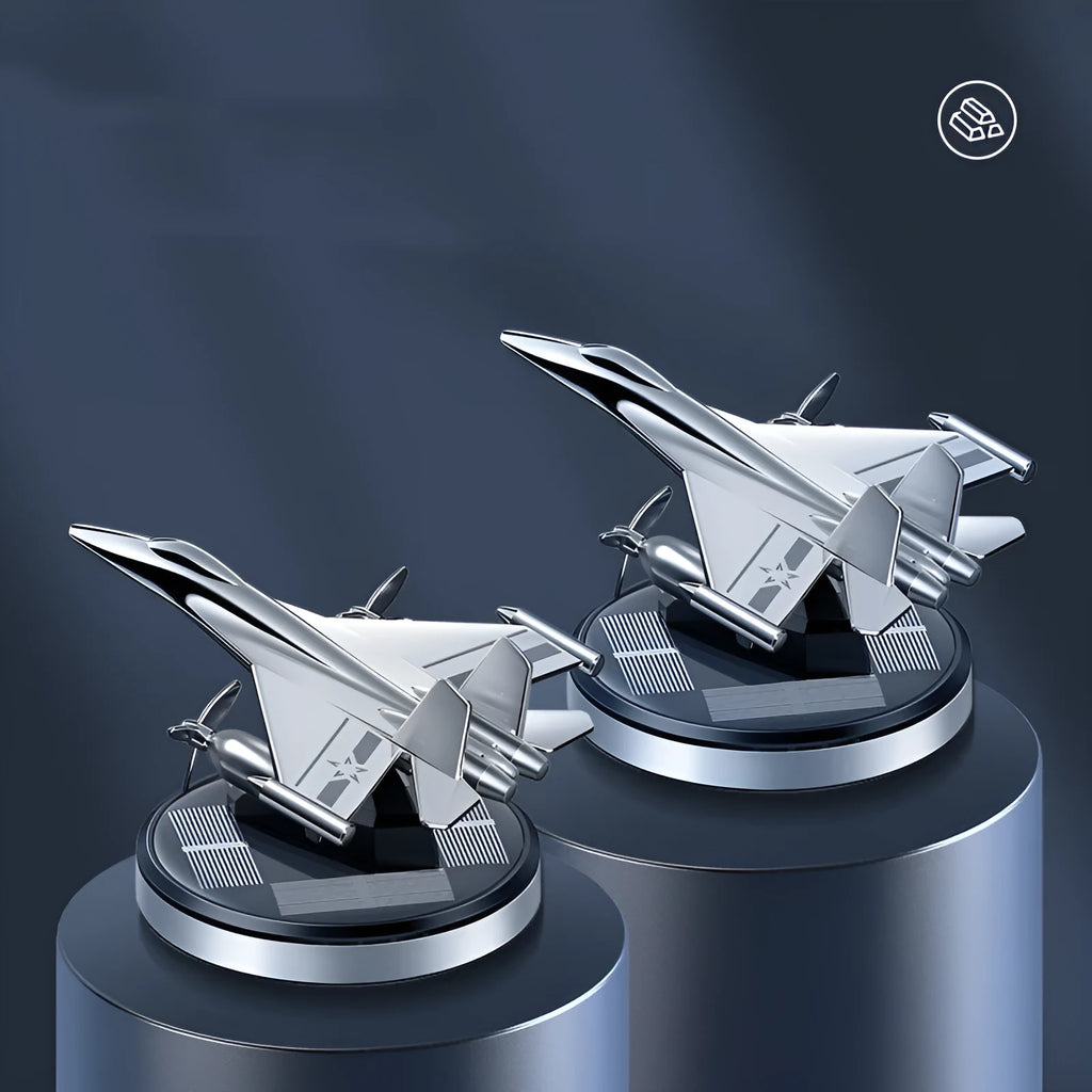 Solar powered rotating silver fighter jet perfume ornament with aluminium alloy seat and essential oil.