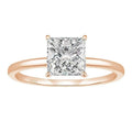 Simple geometric 925 silver ring in silver, gold, and rose gold colours on a plain background.