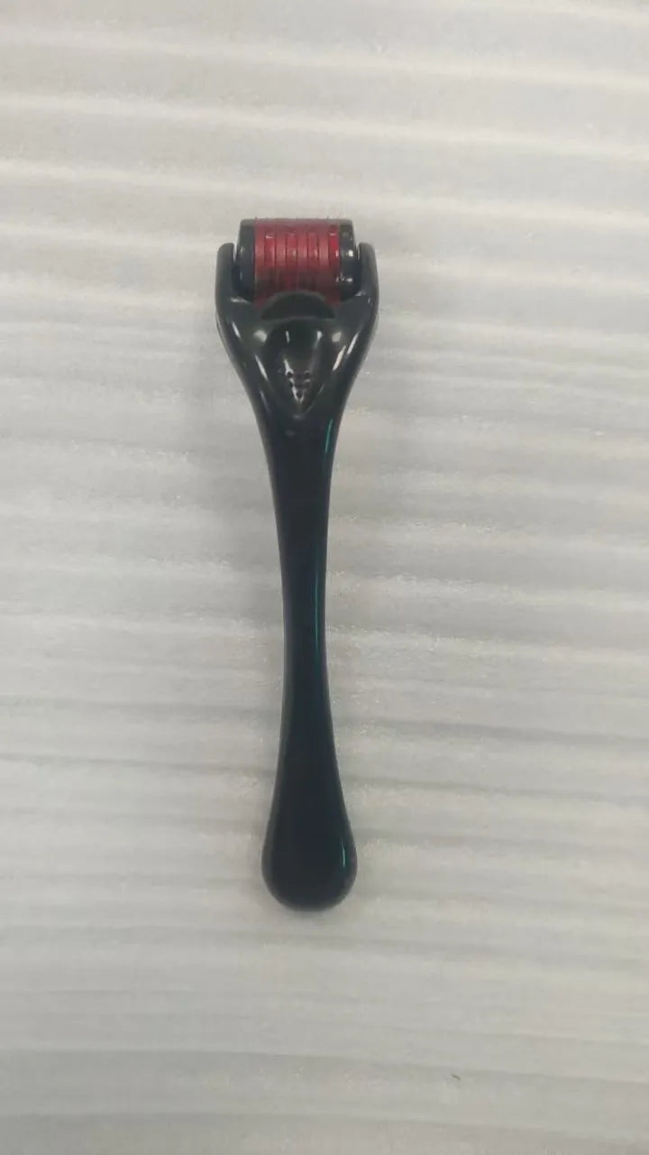 Black handle micro needle roller with purple wheel showing 540 stainless steel needles for dermaplaning