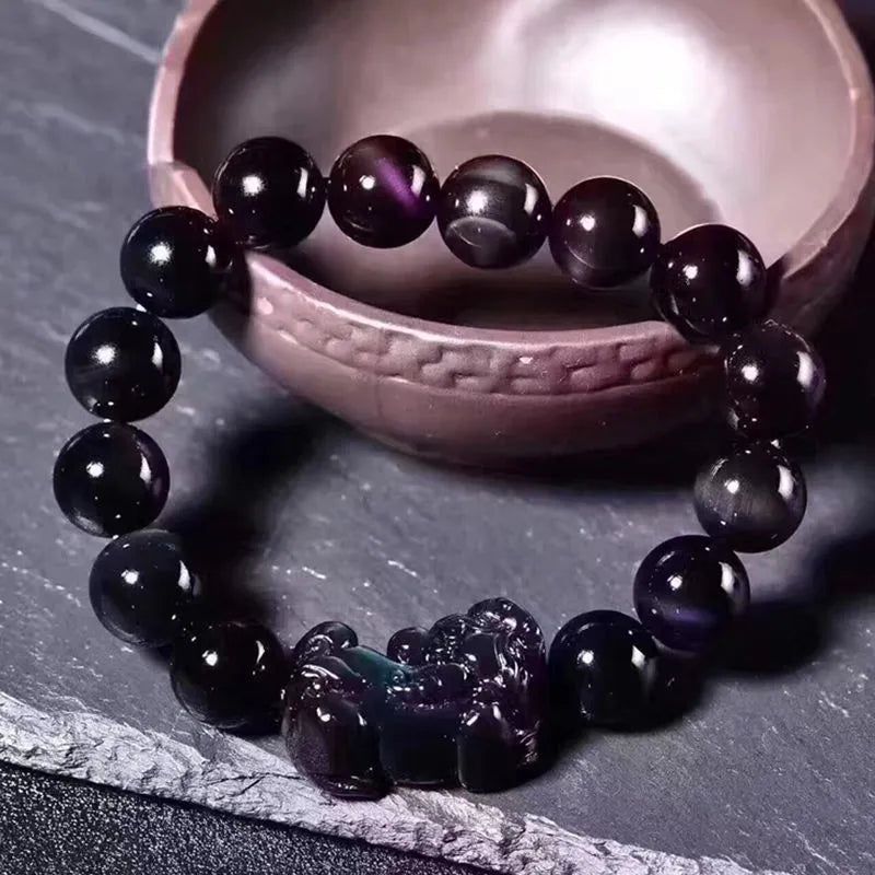 Natural ice colour eye obsidian crystal bracelet showing bead detail and available size options