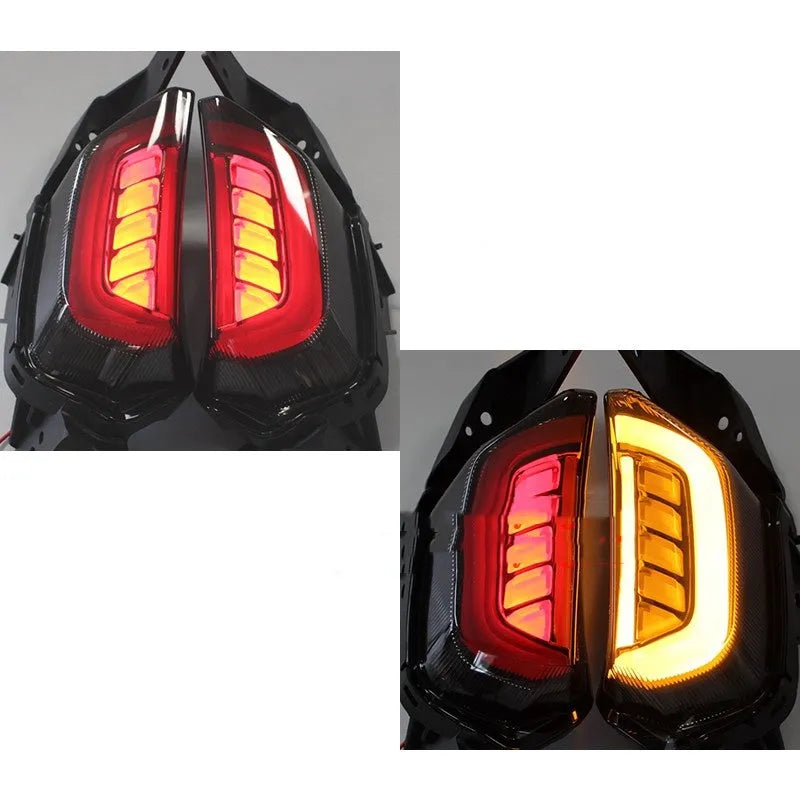 Pair of LED steering turn signal lights for Yamaha NMAX155 scooter in blue and yellow colour.
