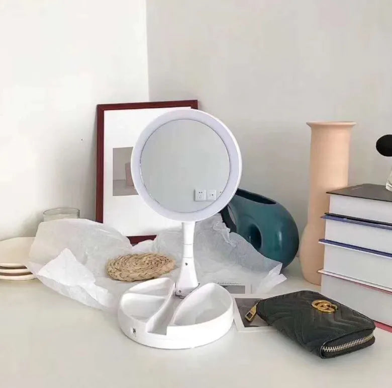 White acrylic frame LED vanity mirror with USB charging and foldable design