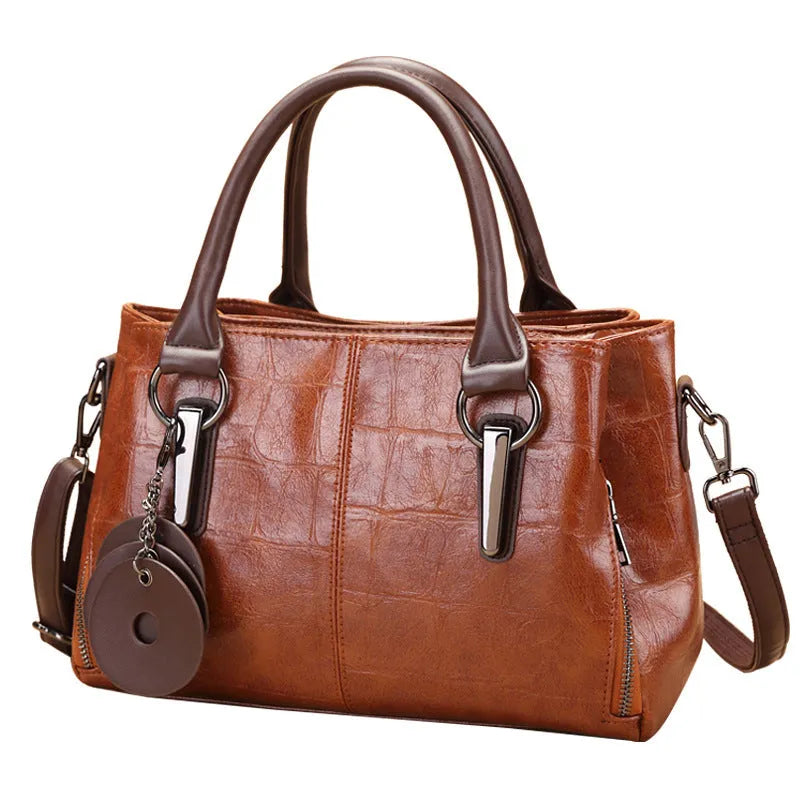 Large capacity shoulder bag in vintage brown with horizontal square design and multiple internal compartments