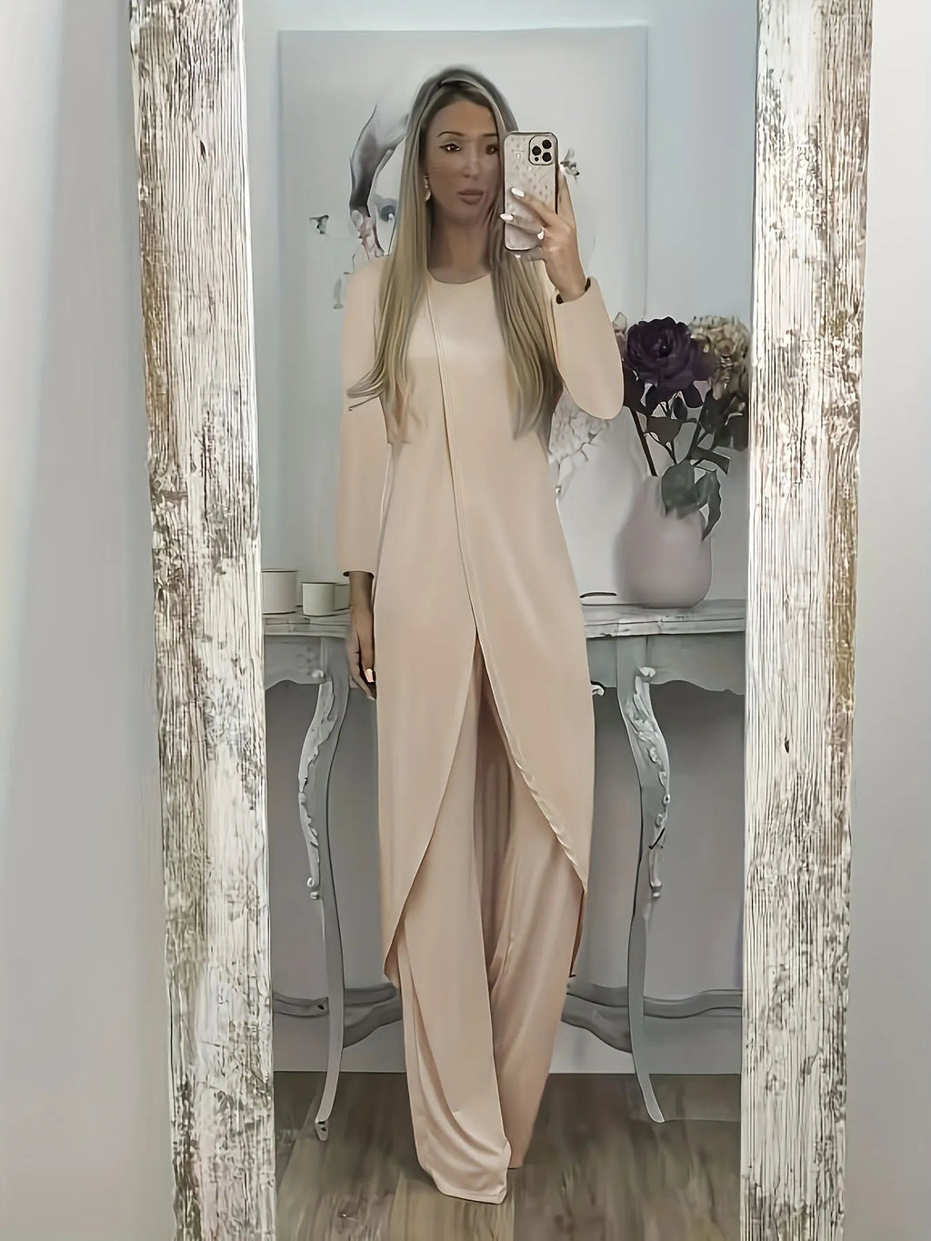 A loose-fitting long sleeve two-piece lounge set in polyester, shown in black, blue, and khaki colour options.
