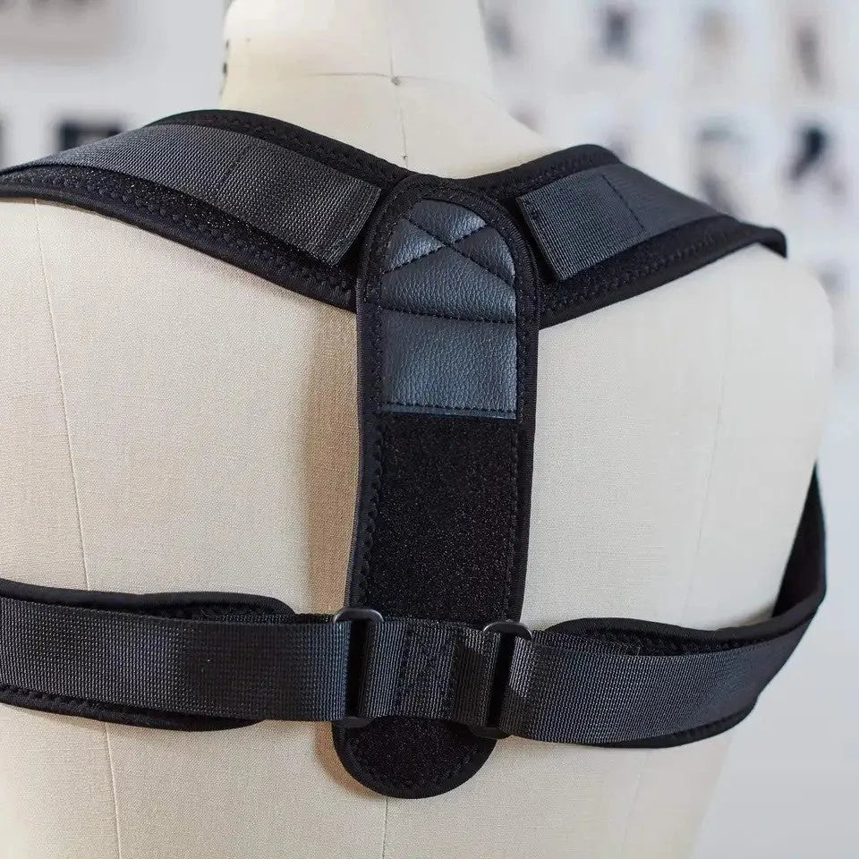 Black adjustable posture correction strap with breathable construction