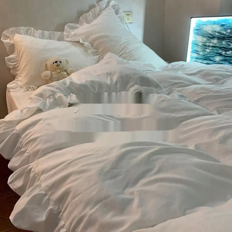 Mori style solid colour linen quilt cover and pillowcases on a bed