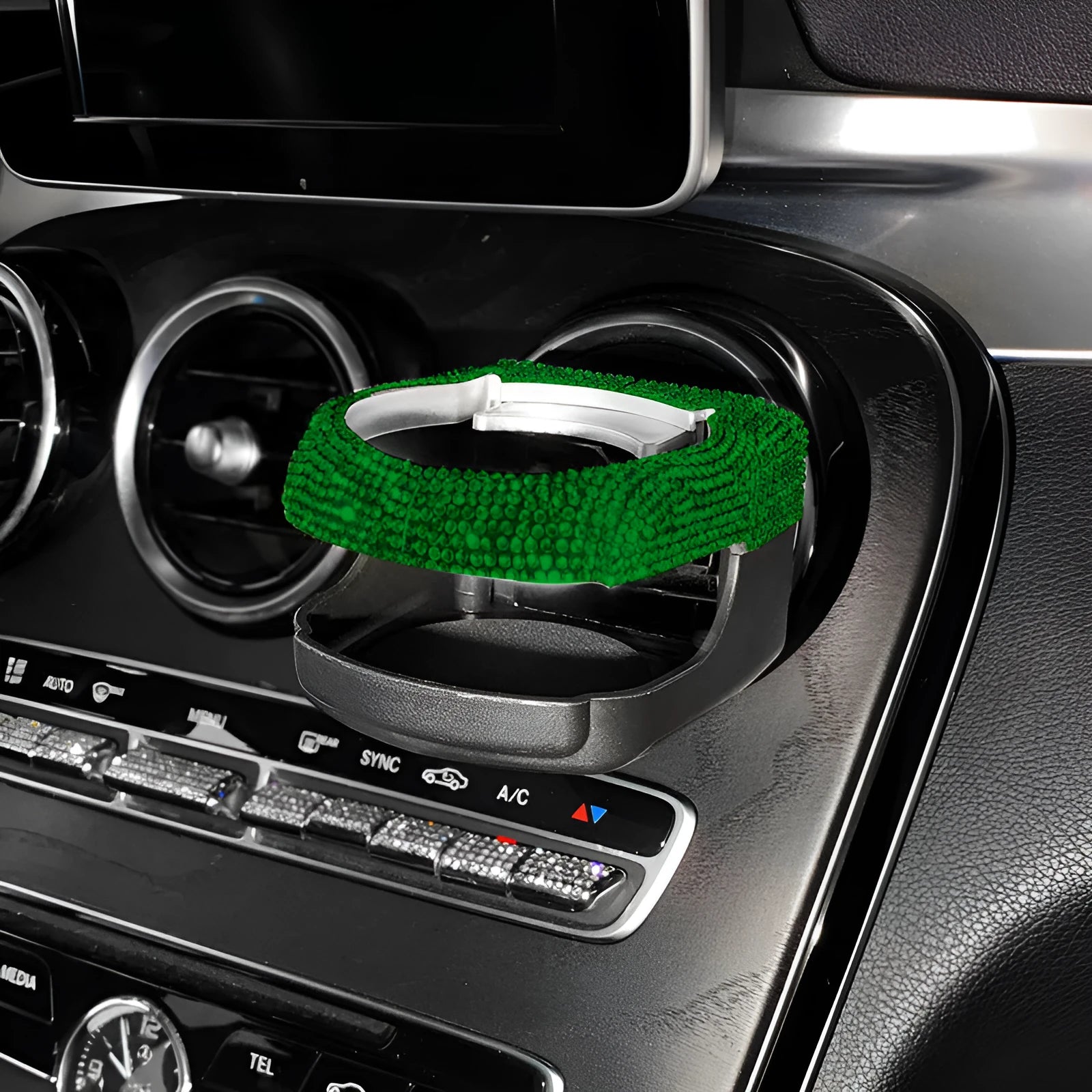 White diamond decorated ABS plastic car vent cup holder mounted in a car air vent.