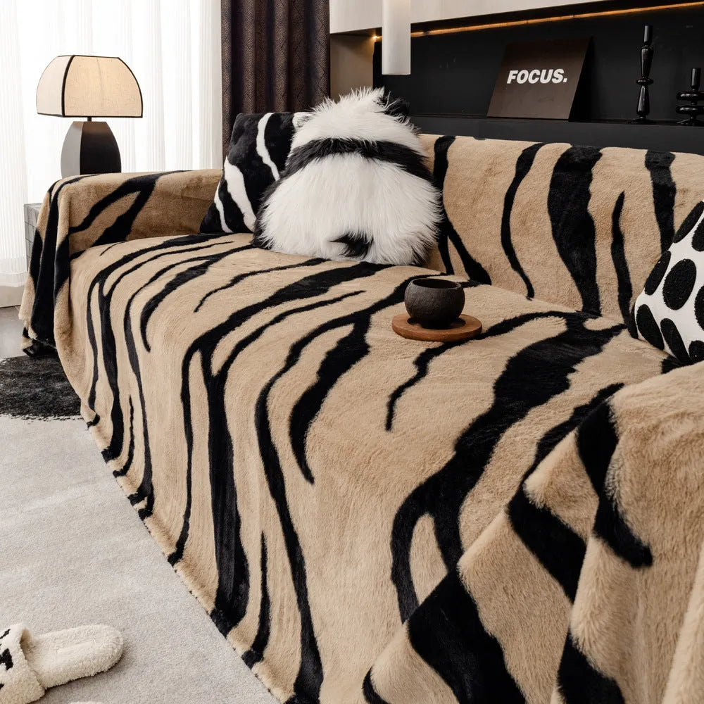 Zebra pattern non-slip flannel sofa cover with matching pillowcase in caramel colour.