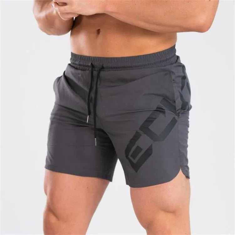 Men's black quick-dry elastic waist running shorts on a white background.