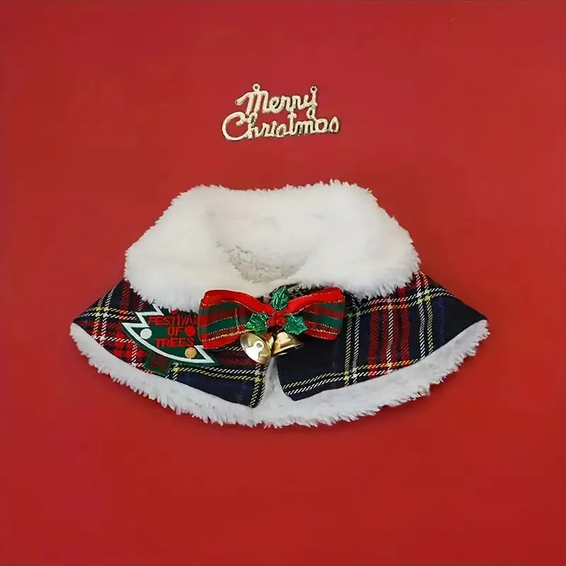 Red holiday pet scarf with bell motif wrapped around dog's neck for Christmas