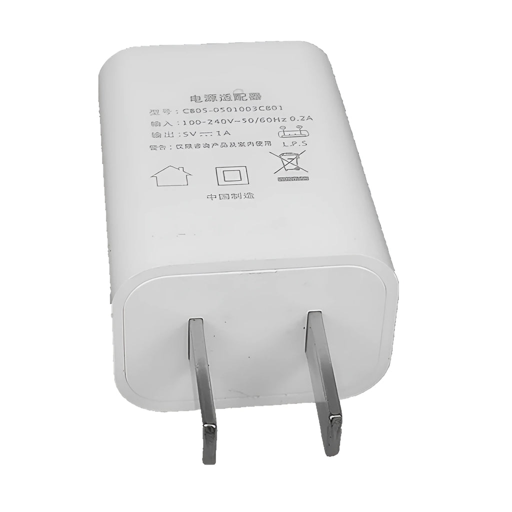 Thin CE FCC certified 5V 1A USB smartphone charger on white background
